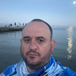 Микола